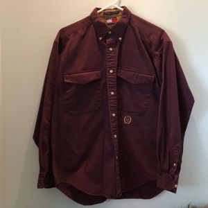 Tommy Hilfiger size medium 100% cotton button down collar, long sleeve shirt